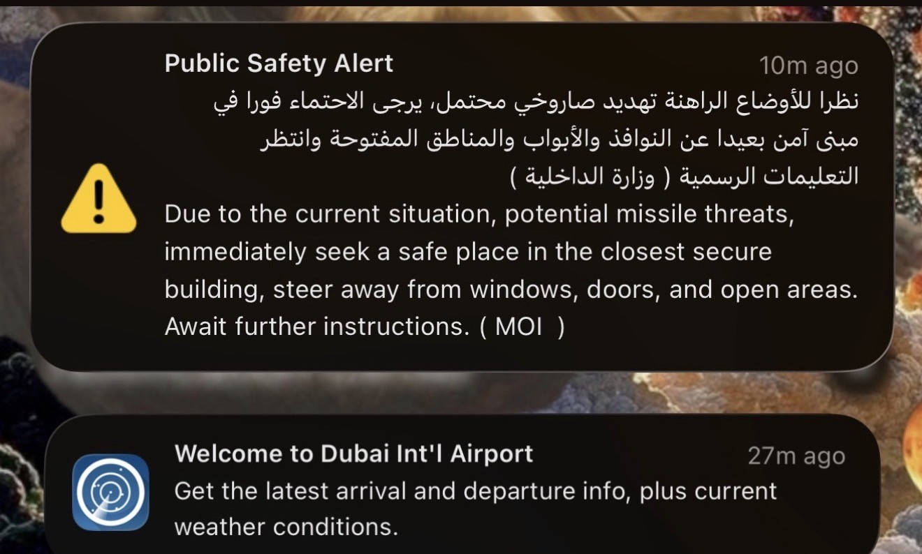 A UAE Ministry of Interior public safety alert warning of potential missile threats and advising people to seek a secure building away from windows and open areas
